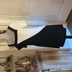 Knee length cotton dress.  Black and white off shoulder.  Never worn